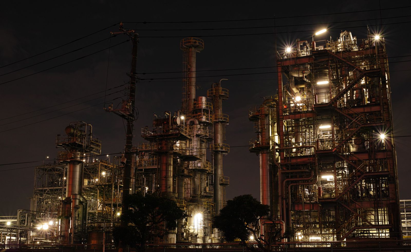 A processing plant lit at night