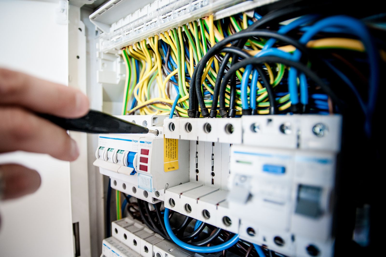 An electrical distribution board with labelled breakers