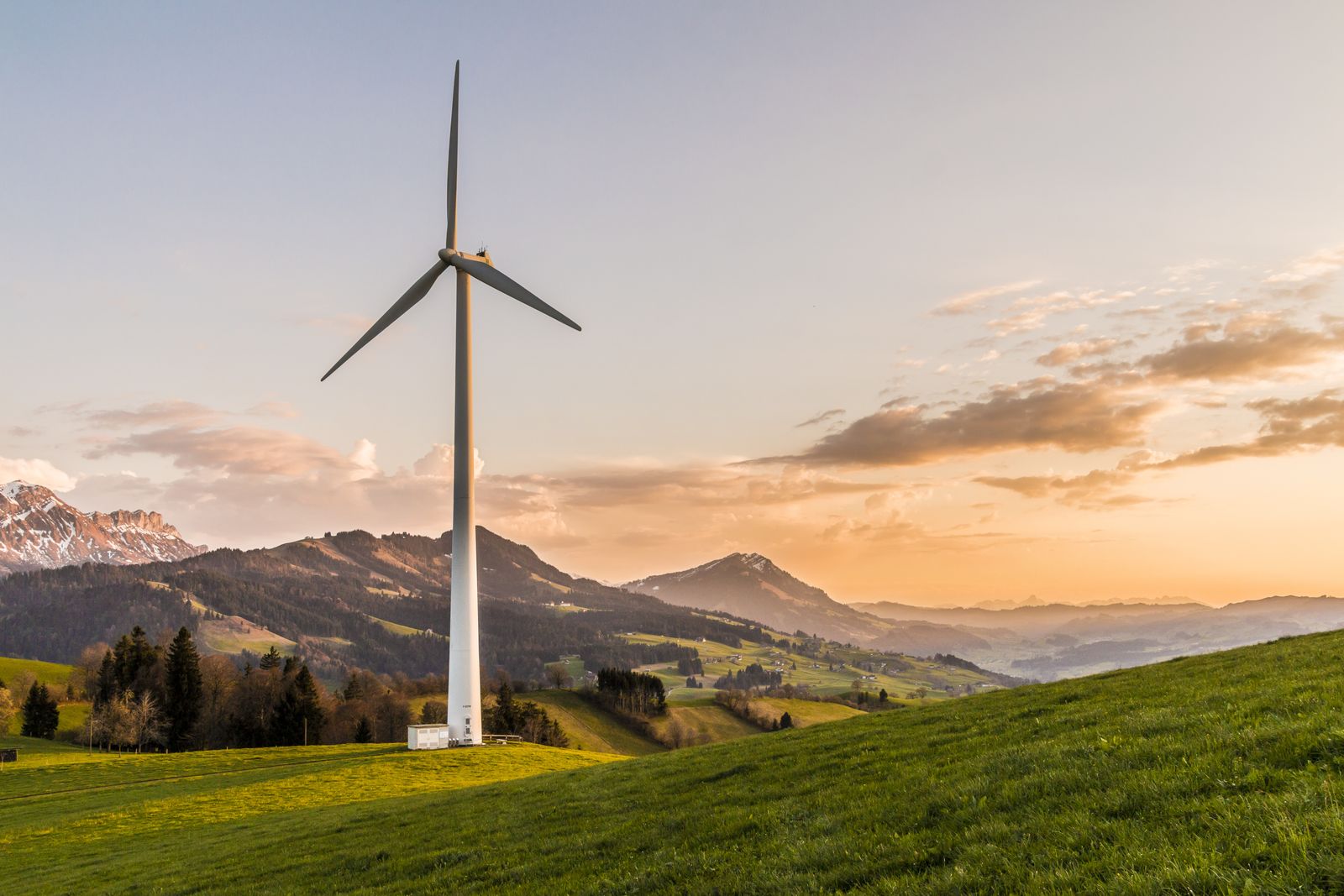 A wind turbine on open ground